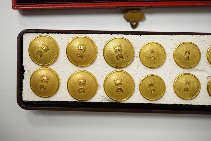 A set of 22 late 19th century gilt brass 'M.C.' (Merton College, Oxford) buttons. Condition - good